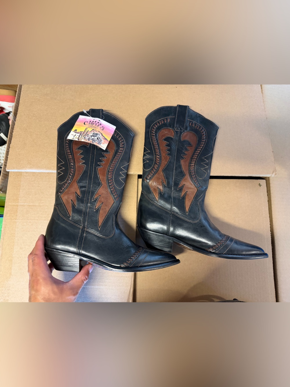 Western-Inspired Black and Brown Leather Ankle Booties